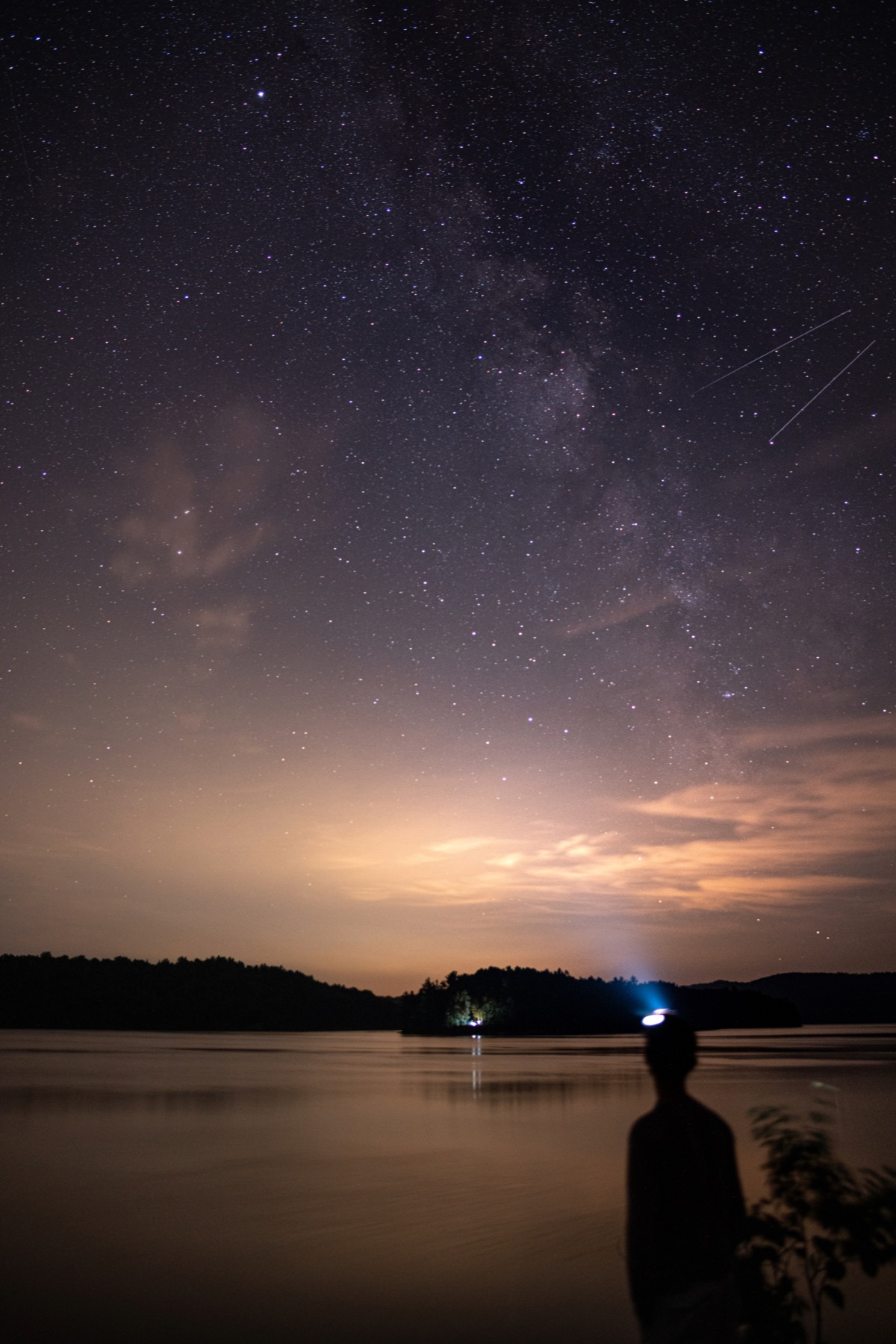 The Milky Way over a coastal landscape